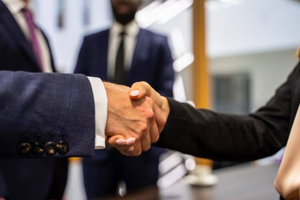 Sales and purchase handshake