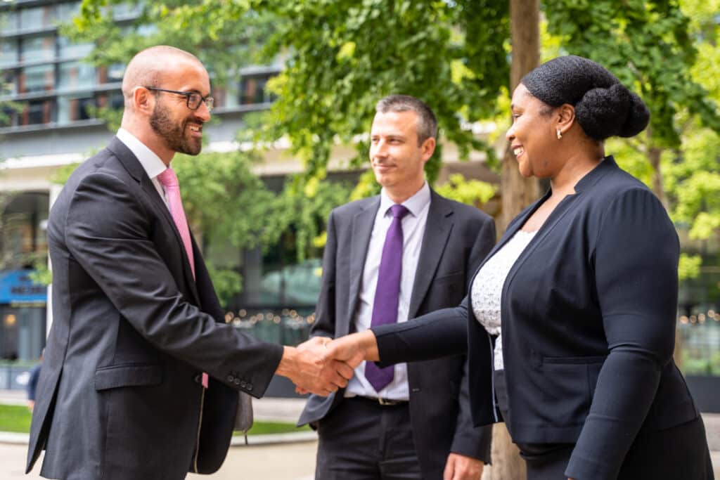 Corporate and commercial solicitors - hand shake